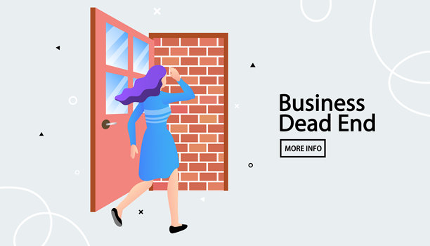 一名女性发现了死胡同，无法找到出路。门口是个死胡同。图片下载
