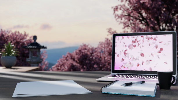 樱花季节在户外使用笔记本电脑工作图片下载