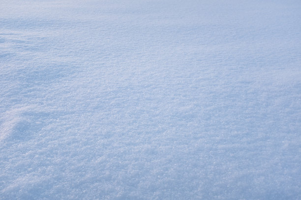 雪景背景，俯视图。雪白的纹理。适用于出版物、海报、屏幕保护程序、壁纸、明信片、横幅、封面和帖子。高质量照片图片下载