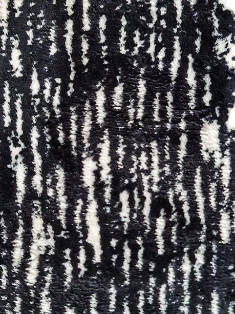 填充框架的照片，地毯图案特写。柔软的毛绒地毯。适合您的家。图片下载