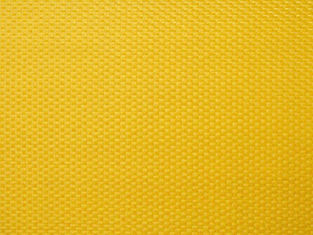 一张特写的纹理面料照片，突显出俏皮的线条和图案，是时尚和设计项目的完美背景。图片下载