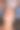 一位专业美容师在患者脸上涂抹滋养霜。保湿、清洁和面部护肤。美容程序的库存照片图片下载