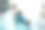 漂亮年轻女孩在现代公寓室内沙发上穿着衬衫阅读书籍的全身照片图片下载