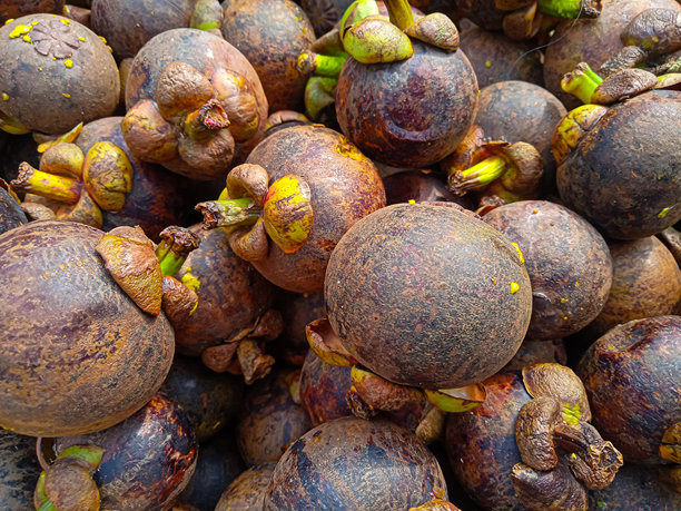 市场上堆放的山竹水果照片图片下载