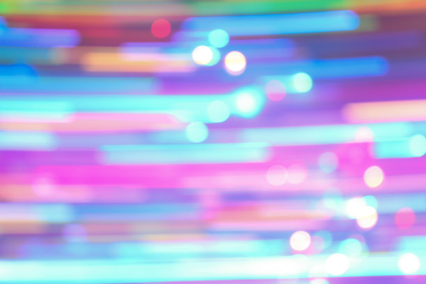 长时间曝光的照片。光绘摄影，鲜艳的仙女灯在黑色背景上呈直线排列；未来科技概念背景。图片下载