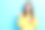 特写照片，年轻可爱迷人的女孩手持手机，手指指向空白处，推荐电子购物优惠，背景为蓝色。图片下载