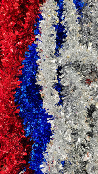 五彩缤纷的亮片作为背景，照片特写。图片下载