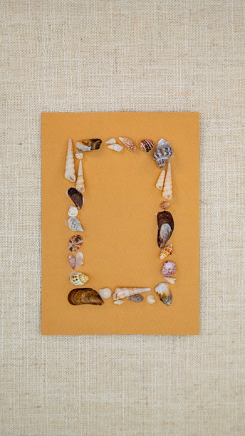 海洋主题手工贺卡，配有贝壳和个性化文本空间，竖版照片图片下载