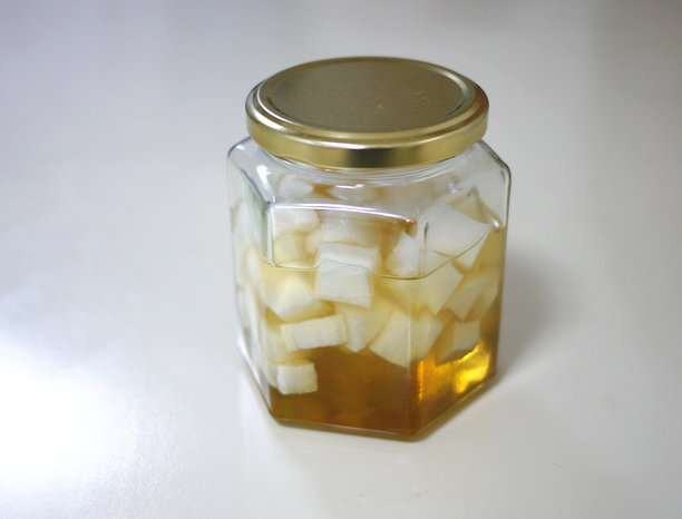 蜜腌萝卜的玻璃瓶照片素材图片下载