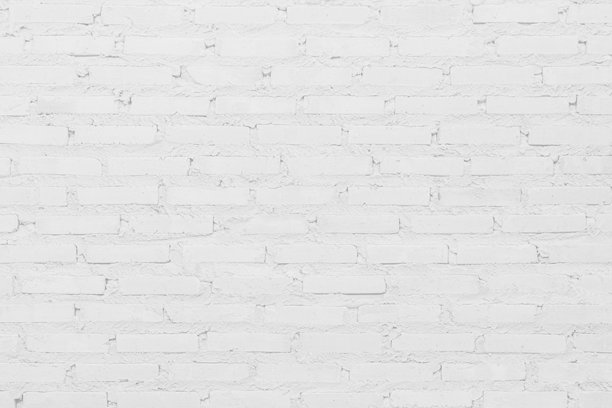 白色砖墙背景照片。复古的白色洗涤涂漆砖墙纹理，适用于灰色浅色墙纸的石材瓷砖块，现代室内外及背景设计的纹理。图片下载