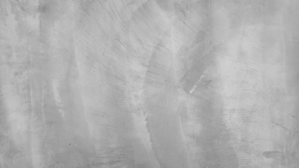 这张图片展示了一面纹理丰富的灰色墙壁特写，展现出细腻的图案和中性色调，适合作为极简背景、网站横幅或设计元素。图片下载