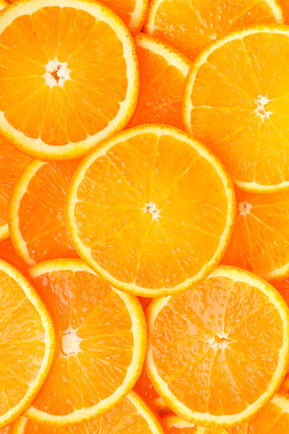 橙子切片特写。垂直照片。俯视图。图片下载