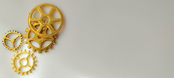 工业行动金色齿轮展示工作坊照片明亮环境特写视角机制概念图片下载