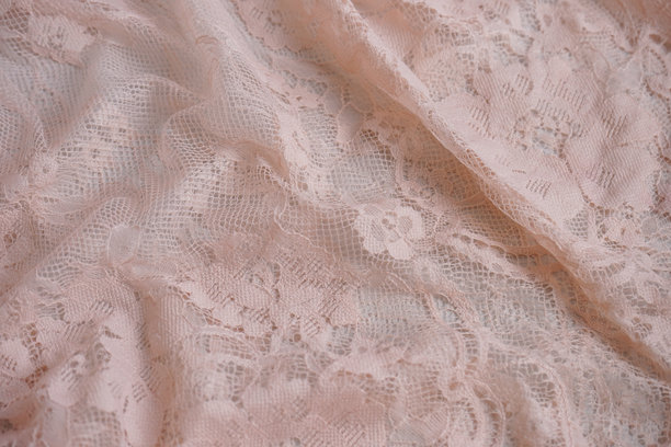 粉色蕾丝薄纱面料的花卉图案纹理。平铺风格，特写照片，工作室拍摄。抽象背景。图片下载