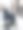 一位白人女性推着她的杰克拉塞尔梗狗在商场里散步。竖版照片。图片下载