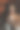 阳光透过百叶窗照亮了一位美丽年轻女性的照片。图片下载