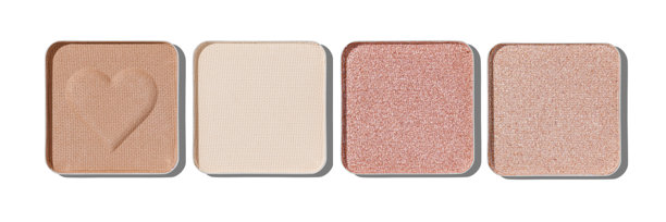 一组中性色调的方形眼影补充装，包括米色和棕色肤色阴影，孤立在白色背景上。化妆品、化妆和美容概念的眼影色板特写照片。图片下载
