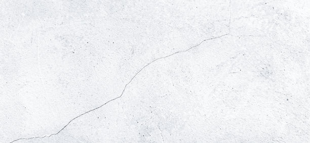 白色混凝土墙的特写，墙面上有一条细长的对角裂缝。纹理背景，照片细节清晰。适合用作背景的优质素材。图片下载