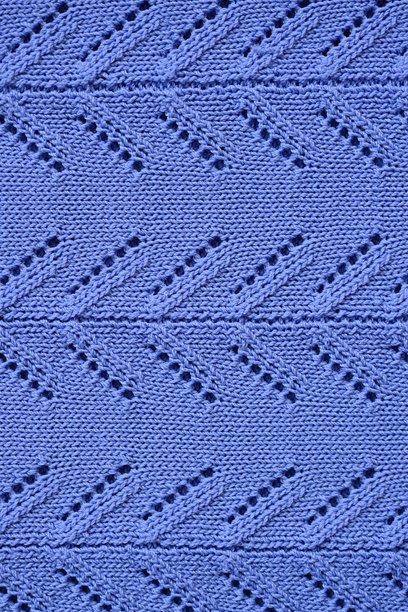 紫色针织面料纹理照片作为背景，紫色针织面部纹理特写图片下载