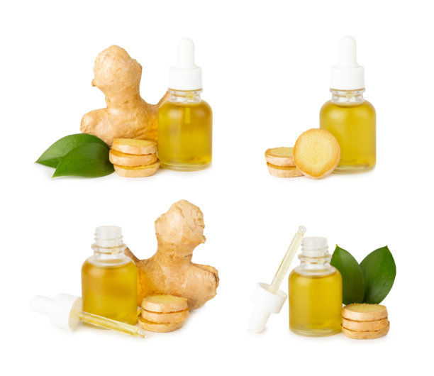 姜精油背景。新鲜姜片。精华，血清，油。替代医学。植物疗法。健康与美容概念。文本位置。留白。图片下载