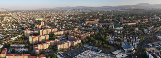 墨西哥城南部的城市日落全景照片图片下载