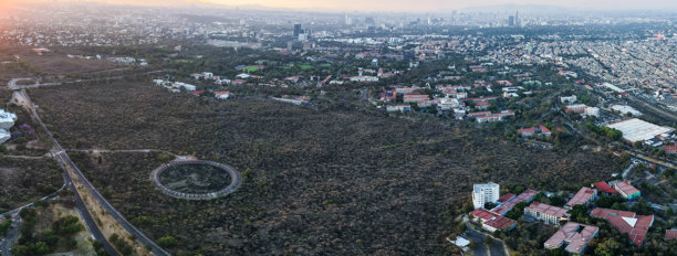 墨西哥城南部的城市日落全景照片图片下载
