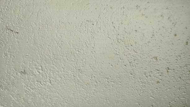 混凝土墙背景。粗糙的水泥纹理背景。灰色混凝土背景上的白色油漆斑点，纹理，照片。旧水泥。图片下载