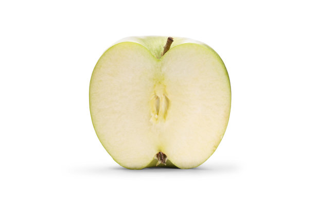 一只绿色苹果被切成两半的工作室拍摄照片图片下载
