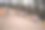 年轻女士和男士们穿着休闲服装坐在海滩旁的篝火旁玩音乐的全景照片图片下载