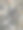 特写照片展示了在海滩上收集的各种形状和大小的多彩湿卵石和石头，展现了自然的纹理和变化。图片下载