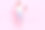 穿着衬衫、牛仔裤和鞋子的甜美千禧一代短发女士，坐在粉色背景前，手指着笔记本电脑的全身照片。图片下载