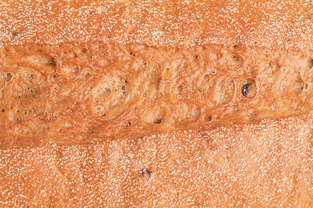 荞麦面包作为背景的特写照片。法棍的质感。图片下载