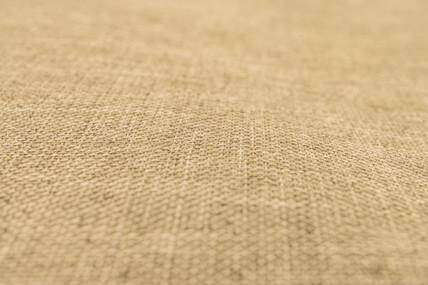 高分辨率的纹理面料库存照片，展示精致的细节和优质的工艺，吸引消费者用于服装、床上用品或家居装饰。图片下载