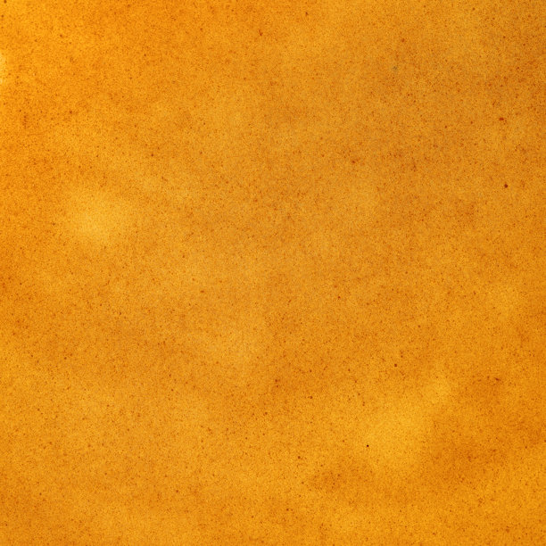 浓缩咖啡奶泡纹理的俯视微距照片。细致的咖啡泡沫背景，带有气泡和丰富的棕色。图片下载