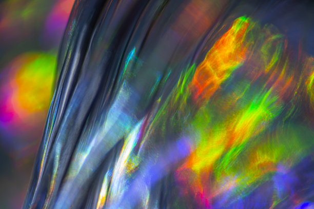 一张充满活力的微距照片，展示了彩虹色和抽象图案图片下载