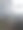 一张情绪化的悉尼郊区航拍照片，通过雨点斑驳的飞机窗户拍摄，画面中有一架在厚厚云层下的澳航飞机机翼。图片下载