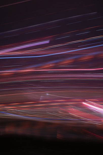 模糊彩色灯光的背景照片。图片下载