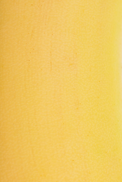 黄色香蕉的纹理作为背景的特写照片。图片下载