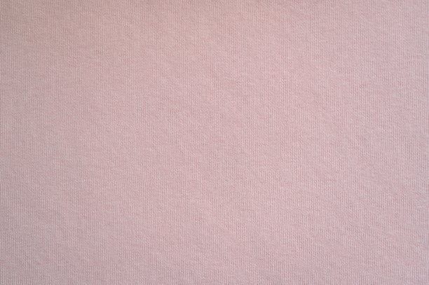 柔和的粉色绒面织物纹理，宏观纹理的浅粉色绒面织物照片作为背景图片下载