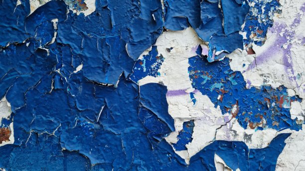 墙上旧油漆的纹理。开裂和剥落，适合用作背景的照片图片下载