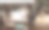 这张图片展示了两位职业女性在现代办公室中。一位微笑着手握咖啡杯，另一位则在使用笔记本电脑。桌子上堆满了文件和办公用品。图片下载