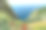 扫描的历史彩色照片，展示了希腊科孚岛帕莱奥卡斯特里察沿海地区的岩石和山脉，阳光明媚。图片下载
