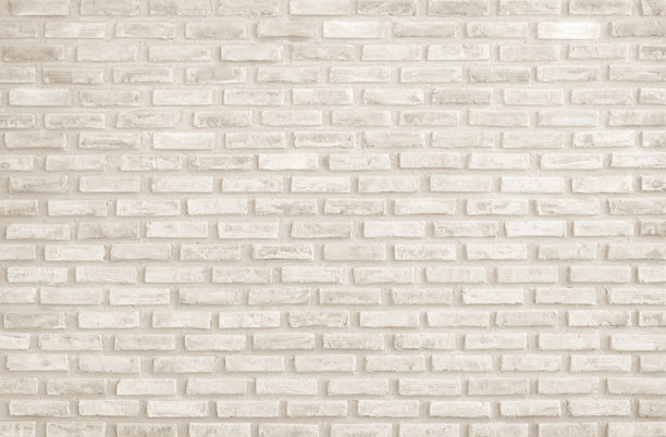 现代奶油砖墙背景照片细节。棕色砖墙纹理背景，适用于涂成黄色的石材瓷砖块，现代室内外背景设计。图片下载