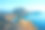 男人在帕达尔岛悬崖上欣赏海岸美景。草坡和海洋构成完美的旅行照片。图片下载