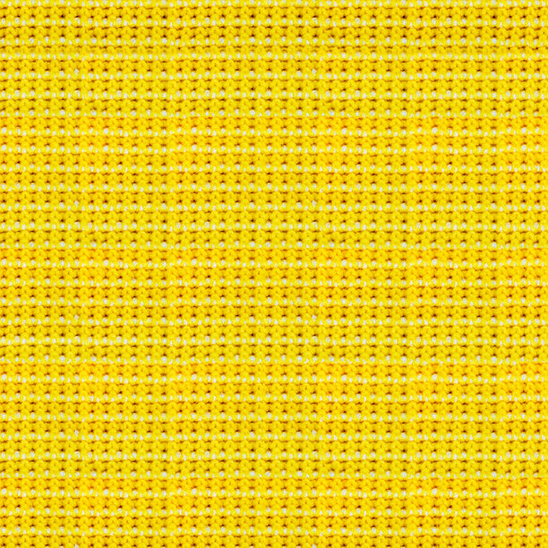 无缝的4K黄色打孔布料照片纹理。图片下载
