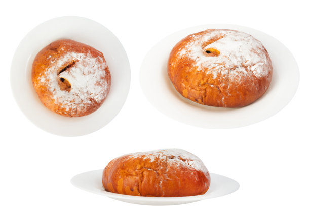 白色背景上盘子里的甜面包孤立照片。图片下载