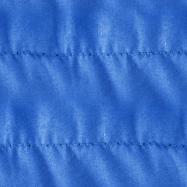无缝特写4K照片，蓝色绗缝棉质材料的纹理。图片下载