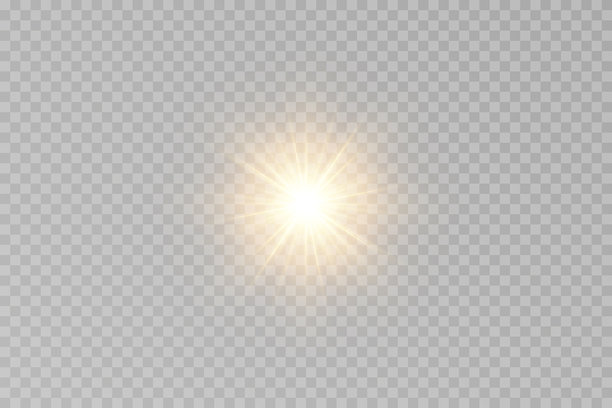 明亮的太阳镜头光晕，金色光线和棱镜散景在黑色背景上。用于叠加、照片滤镜或电影灯光的抽象日光效果。图片下载