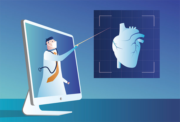医生在桌面电脑屏幕上讲解心脏健康知识，远程医疗图片下载