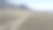 大盆地公路穿越内华达沙漠。空中视角下，一辆孤独的汽车在怀特派恩县的山地景观中行驶。图片下载
